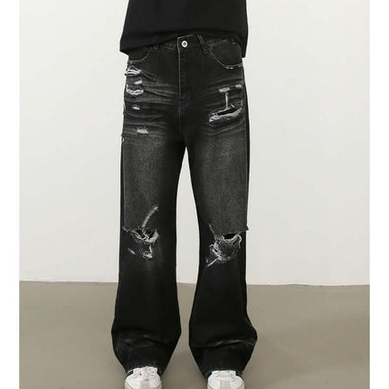 Washed Distressed Straight Jeans – Loose Fit displayed on model, featuring a vintage washed denim look and distressed details.
