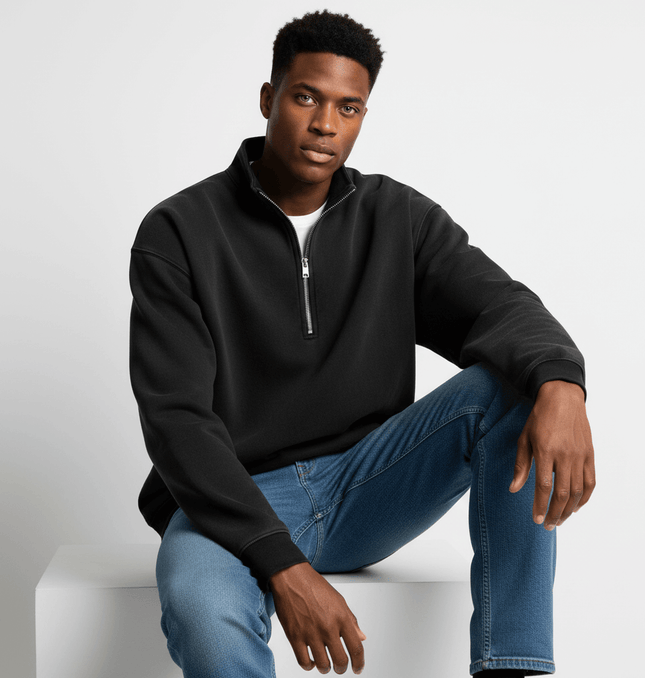 Washed Stand Collar Zipper Hoodie worn by model seated on a pedestal, showcasing urban street fashion style.