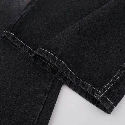 Washed Straight Black Jeans – Loose Fit close-up of the hem showcasing the stylish details and fabric texture.