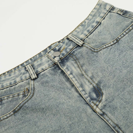Washed Straight Cropped Jeans close-up detail showing light blue washed finish and button closure.