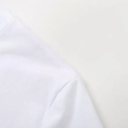 Cotton TShirt with Oil Painting Print close-up of the shoulder in soft white fabric