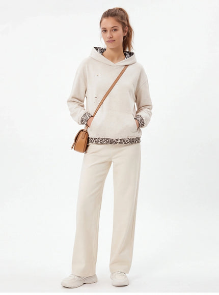 Model wearing gray animal pattern patchwork perforated sweatshirt by Grozavu