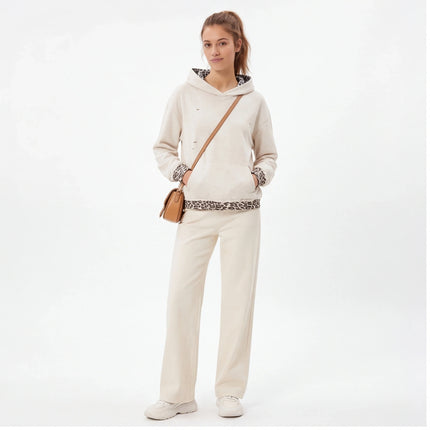 Model wearing gray animal pattern patchwork perforated sweatshirt by Grozavu