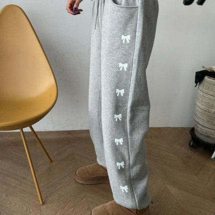 Women's New High Waist Elastic Bow Printed Velvet Casual Pants at €48.99