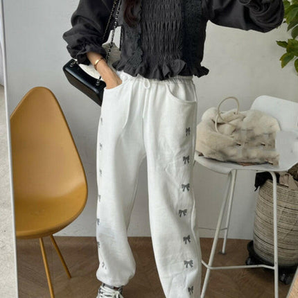 Women's New High Waist Elastic Bow Printed Velvet Casual Pants at €48.99