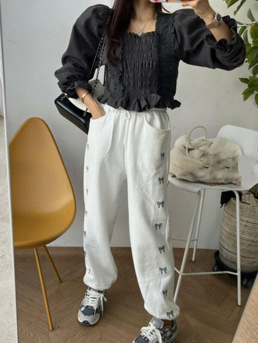 Women's New High Waist Elastic Bow Printed Velvet Casual Pants at €48.99