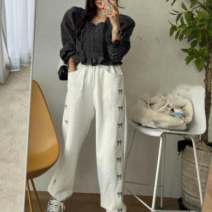 Women's New High Waist Elastic Bow Printed Velvet Casual Pants at €48.99