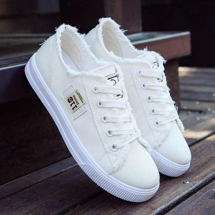 Stylish Canvas Sneakers for Women: Casual and Comfortable Lace-Up Shoes at €21.99